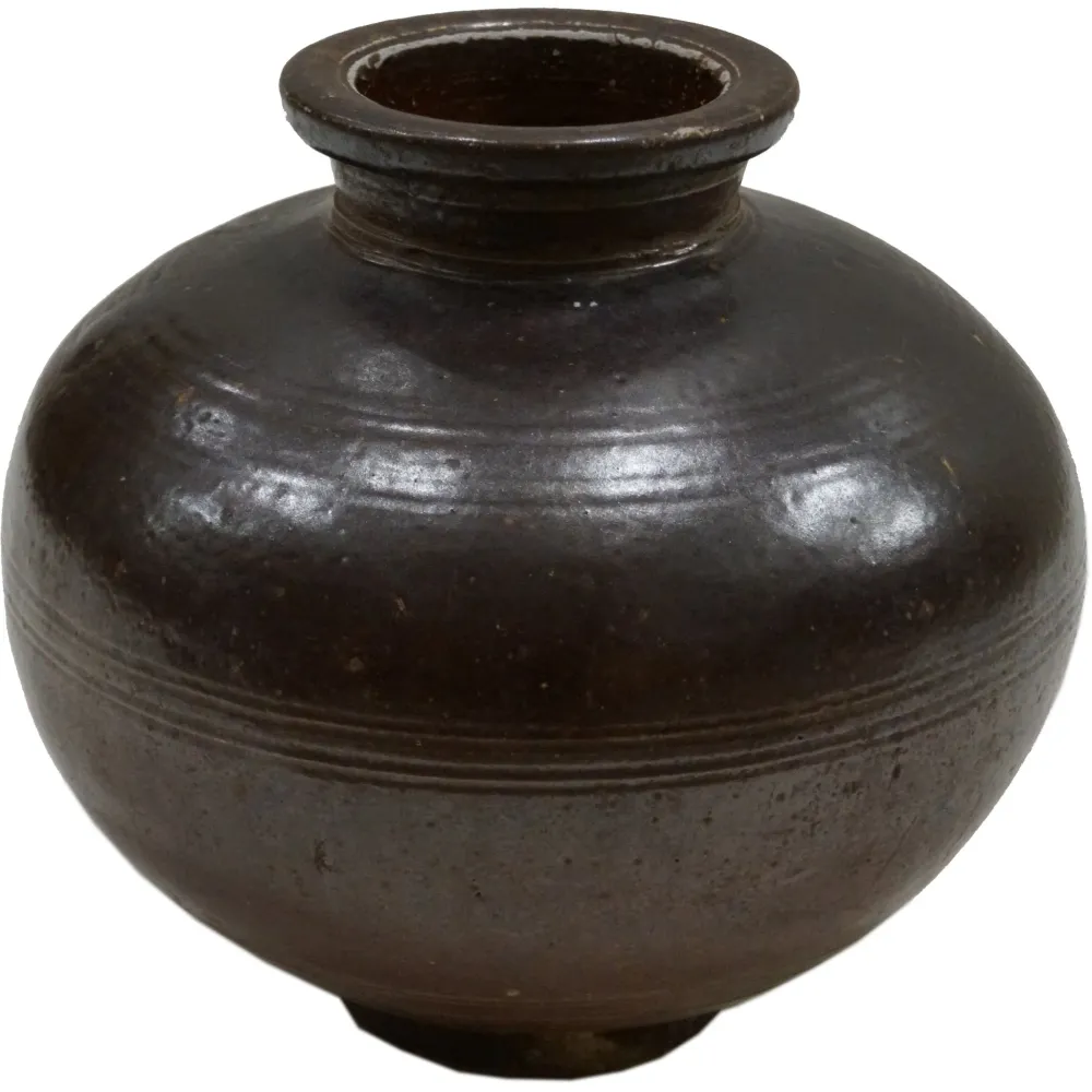 Gammel leirkrukke med patina