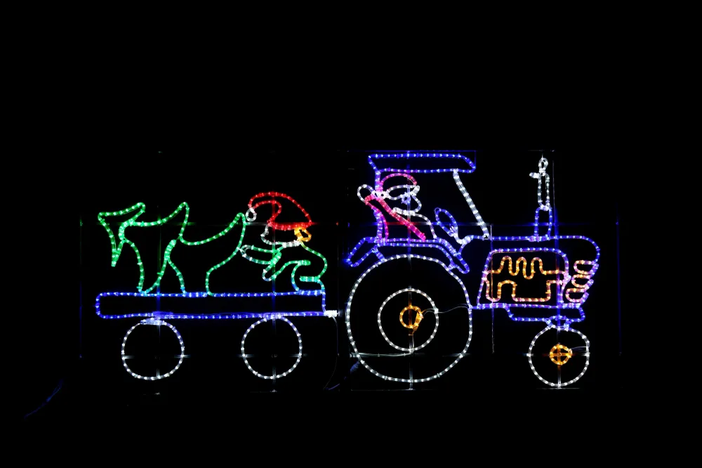 Julenisse i blå traktor - med alv - 230x105 cm