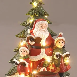 Julenissen foran juletre