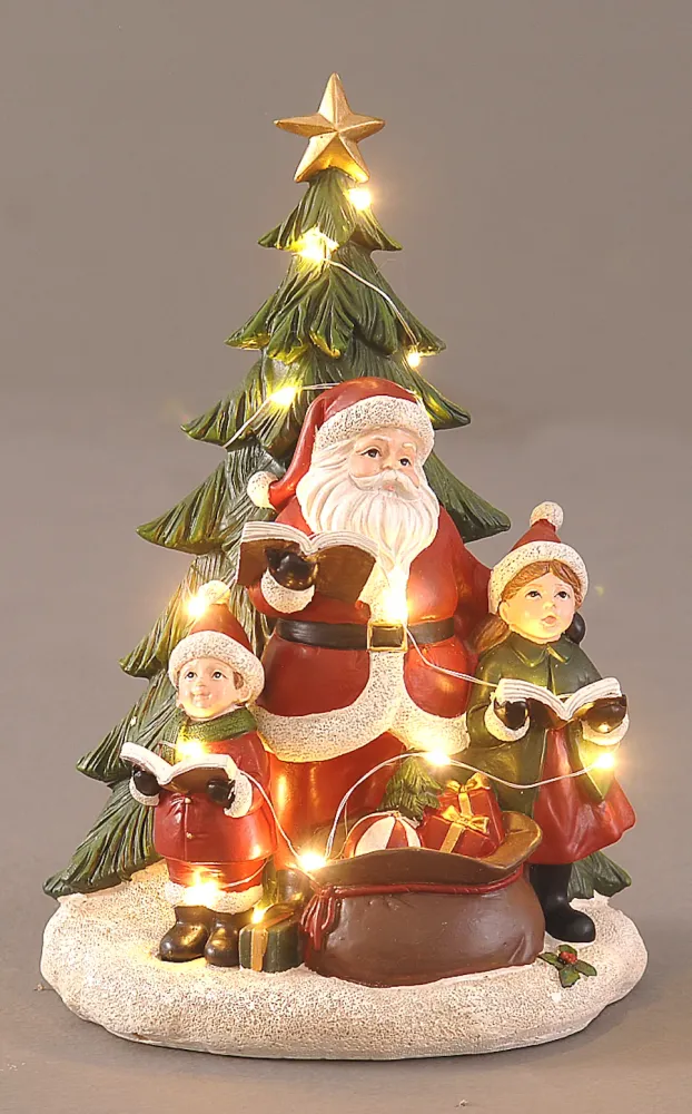 Julenissen foran juletre