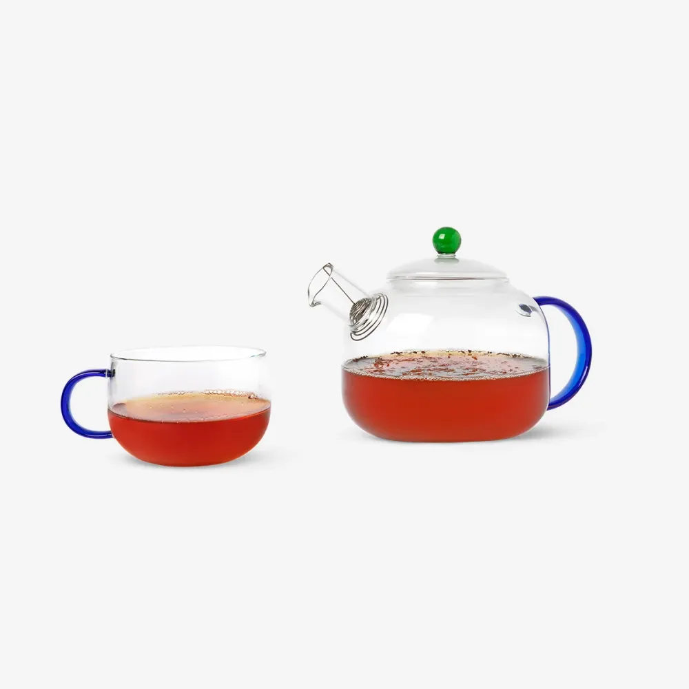 Designerkolleksjon - Glasskrus med blått håndtak - 350 ml