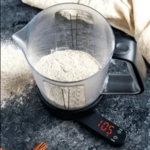 Kjøkkenvekt med målebeger