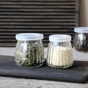 Oppbevaringsglass m. riller & lokk - sett med 2 stk