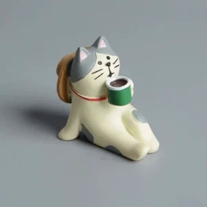 Tedrikkende katt, figurin