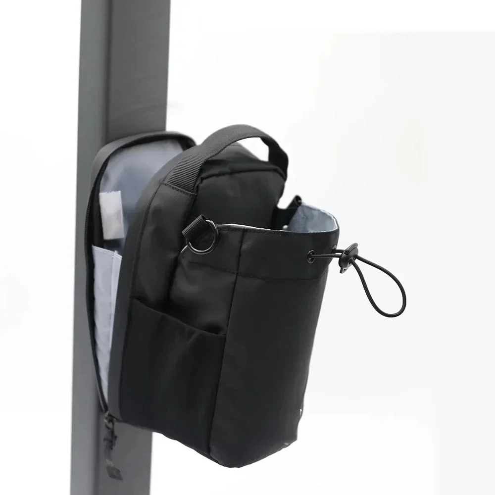 Magnetisk vannflaskeholder treningsstudio - Hands-Free Hydration Bag med telefonlomme
