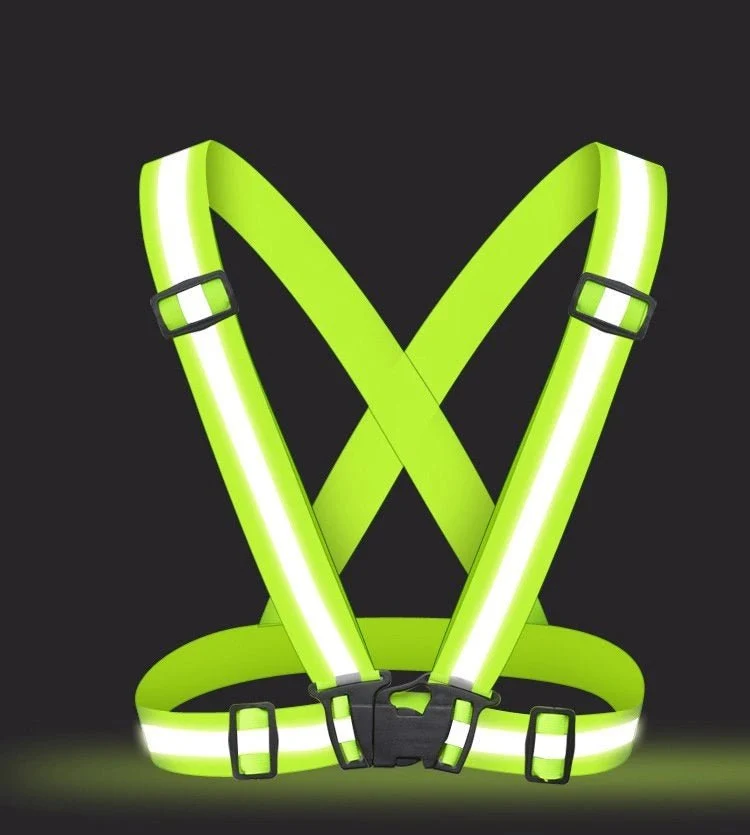 Justerbart reflekterende fluorescerende sele